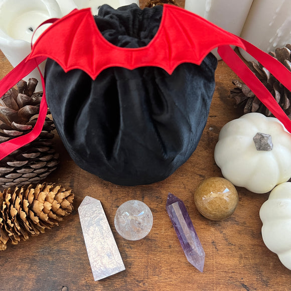 Amaranth Bat Wing Crystal Filled Bag